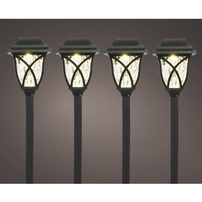 Set de 4 postes solares para jardín, luz cálida