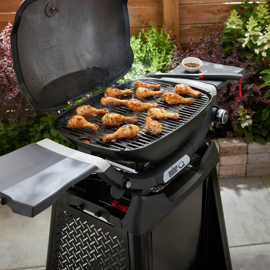 Weber Q 2200N barbecue with side tables and premium cart