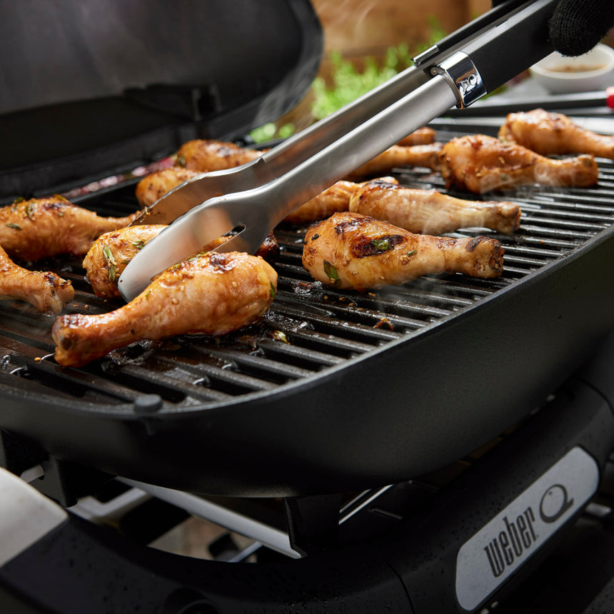 Weber Q 2200N barbecue with side tables and premium cart