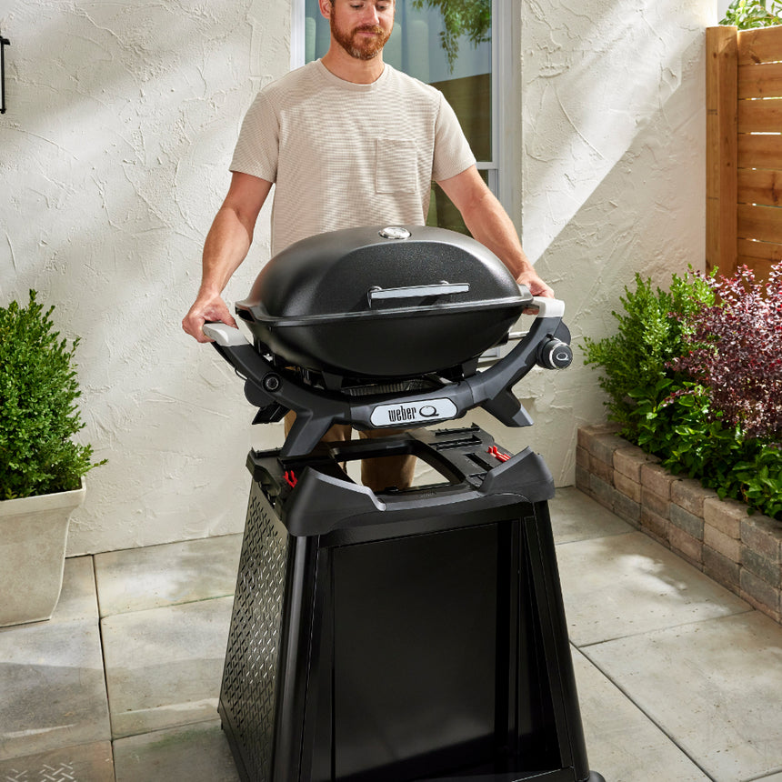 Weber Q 2200N barbecue with side tables and premium cart