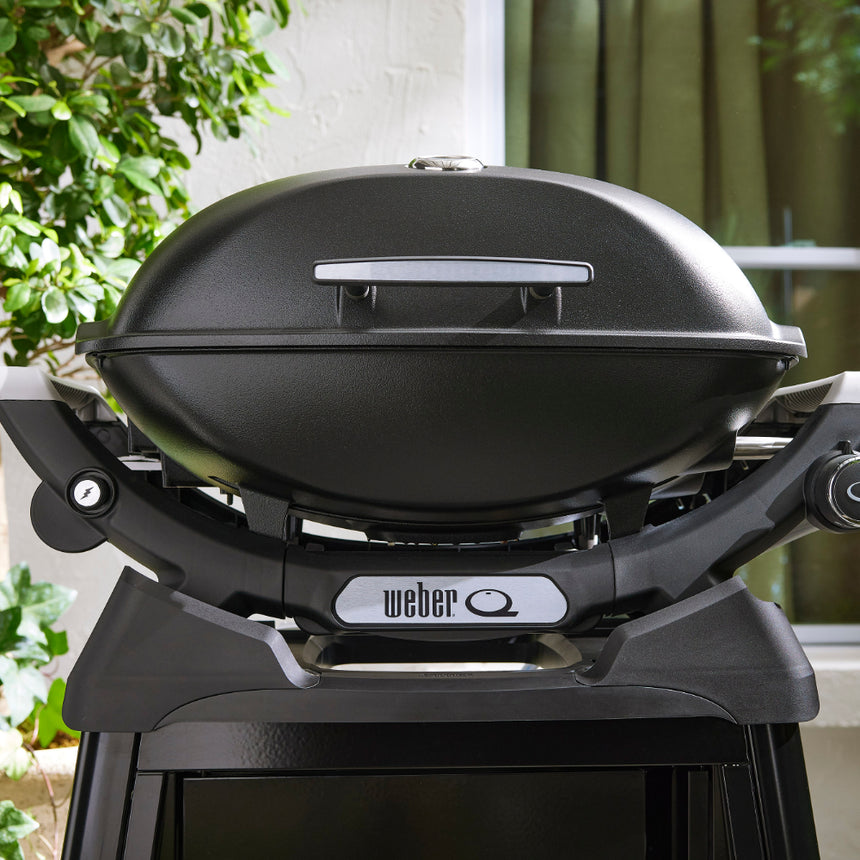 Weber Q 2200N barbecue with side tables and premium cart