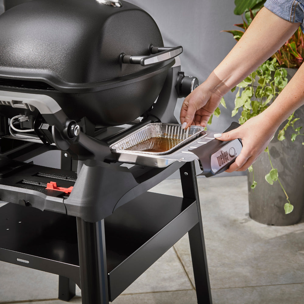 Weber Q 2200N barbecue with side tables and premium cart