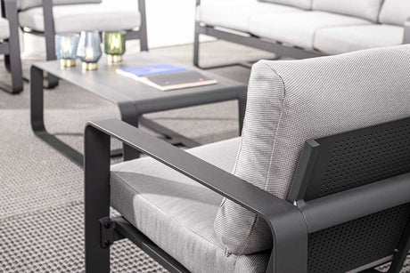 Conjunto Merrigan sofá + 2 sillones + mesa, color antracita