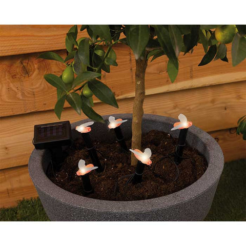 Decorative solar lights for flower pots and flower beds, in the shape of bees