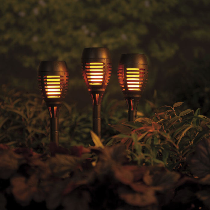 Set de 4 postes solares para jardín, efecto llama